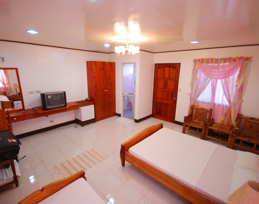 Reddoorz Premium @ Flower Beach Anda Anda  Exterior photo